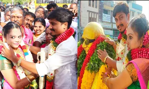 கலைஞர் சிலை முன்பு திருமணம் செய்து கொண்ட மணமக்கள்...!