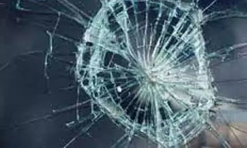 தேவதானப்பட்டி அருகே அரசு பஸ் கண்ணாடி உடைப்பு