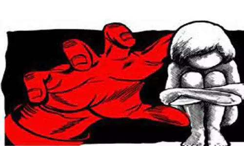 பெண்ணை கற்பழித்து கொலை மிரட்டல் விடுத்த தொழில் அதிபர் கைது