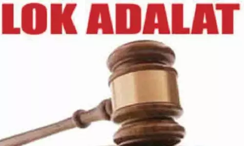 தேசிய மக்கள் நீதிமன்றத்தில் 2,292 வழக்குகளுக்கு தீர்வு