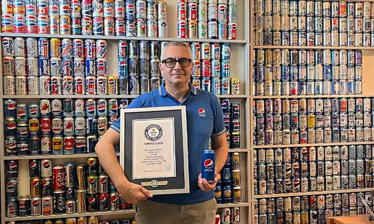 12 ஆயிரம் பெப்சி கேன்களை சேகரித்து கின்னஸ் உலக சாதனை படைத்த மனிதர்..!! 12 ஆயிரம் பெப்சி கேன்களை சேகரித்து கின்னஸ் உலக சாதனை படைத்த மனிதர்..!!