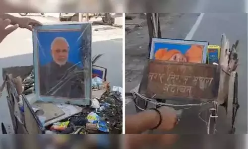 குப்பை வண்டியில் பிரதமரின் புகைப்படம்: பணிநீக்கம் செய்யப்பட்ட ஊழியர் மீண்டும் பணியில் சேர்ப்பு குப்பை வண்டியில் பிரதமரின் புகைப்படம்: பணிநீக்கம் செய்யப்பட்ட ஊழியர் மீண்டும் பணியில் சேர்ப்பு