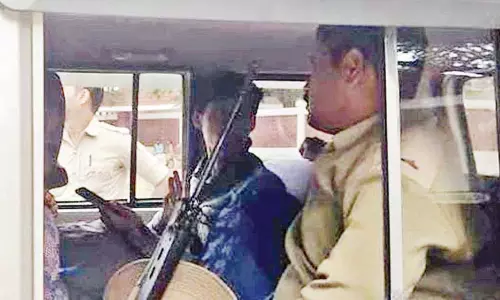 பர்தா அணிந்தபடி அலமட்டி அணைக்குள் நுழைய முயன்றவர் கைது