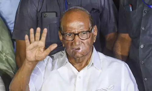 ஆணவத்தை காட்டும் பா.ஜனதாவுக்கு சாதாரண மக்கள் பாடம் புகட்டுவார்கள்-சரத்பவார் எச்சரிக்கை