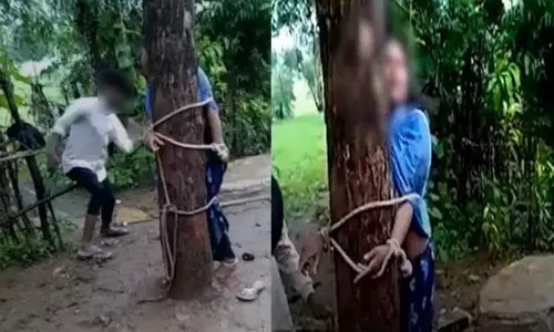 பெண்ணை 7 மணிநேரம் மரத்தில் கட்டி வைத்து அடித்த கொடூரம்; 2 சிறுவர்கள் உள்பட 6 பேர் கைது பெண்ணை 7 மணிநேரம் மரத்தில் கட்டி வைத்து அடித்த கொடூரம்; 2 சிறுவர்கள் உள்பட 6 பேர் கைது