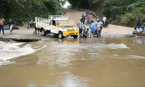 நஞ்சுண்டாபுரம் தரைப்பாலம் உடைப்பு