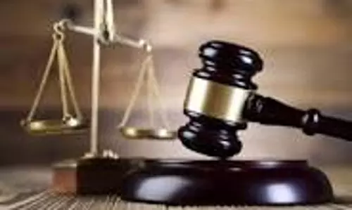 விவசாயியை கொல்ல முயன்ற வழக்கு:  நாமக்கல் கோர்ட்டில் 2 பேர் சரண்