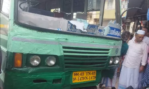 அரசு பஸ் மோதி பெண் படுகாயம்