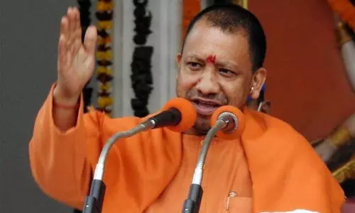 கர்நாடகம் எப்போதும் பிரச்சினையை தீர்க்கும் மாநிலமாகவே உள்ளது - யோகி ஆதித்யநாத் பேச்சு