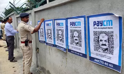 40 சதவீத கமிஷன் குற்றச்சாட்டுடன் பசவராஜ் பொம்மைக்கு எதிராக போஸ்டர் ஒட்டிய காங்கிரசார்