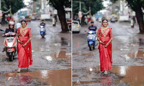 குண்டும், குழியுமான சாலையில் போட்டோ ஷூட் நடத்திய மணப்பெண்