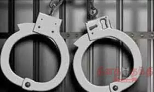 உருட்டுக்கட்டையுடன் மிரட்டியவர் கைது