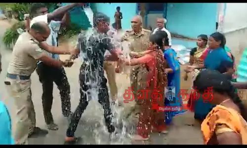 வாலிபர் தீக்குளிக்க முயற்சி