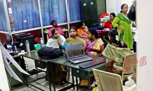 குழந்தைகள் பாதுகாப்பு அலுவலக  பெண் ஊழியர் உள்பட 2 பேர் கைது