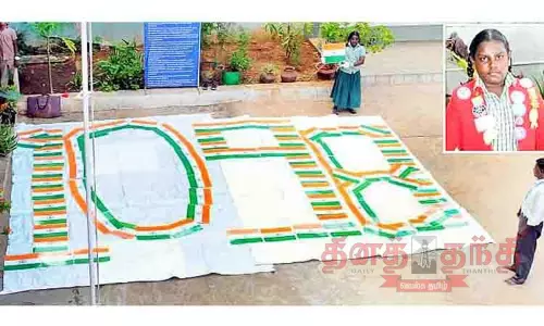 தேசிய கொடிகளால் குழந்தைகள் பாதுகாப்பு எண்ணை உருவாக்கி பள்ளி மாணவி சாதனை