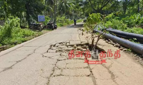 நடுரோட்டில் திடீர் பள்ளம்