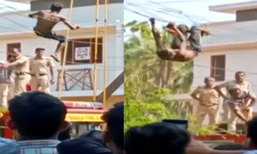 பொதுமக்களிடம் சிக்காமல் இருக்க திடீரென மின்கம்பியில் தாவிய திருடன் - கேரளாவில் பரபரப்பு பொதுமக்களிடம் சிக்காமல் இருக்க திடீரென மின்கம்பியில் தாவிய திருடன் - கேரளாவில் பரபரப்பு