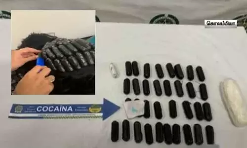 கொலம்பியாவில் சவுரி முடிக்குள் ஒளித்து வைத்து போதைப்பொருள் கடத்த முயற்சி - 2 பெண்கள் கைது கொலம்பியாவில் சவுரி முடிக்குள் ஒளித்து வைத்து போதைப்பொருள் கடத்த முயற்சி - 2 பெண்கள் கைது