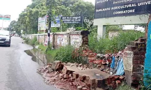 விபத்து ஏற்படுத்த காத்திருக்கும் சுற்றுச்சுவர்