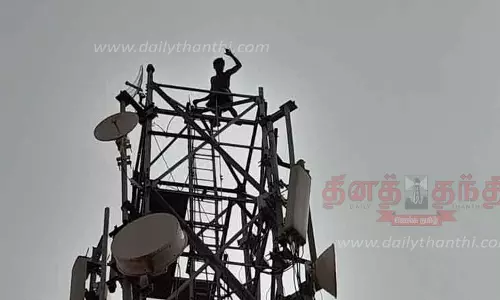 செல்போன் கோபுரத்தில் ஏறி தொழிலாளி தற்கொலை மிரட்டல்
