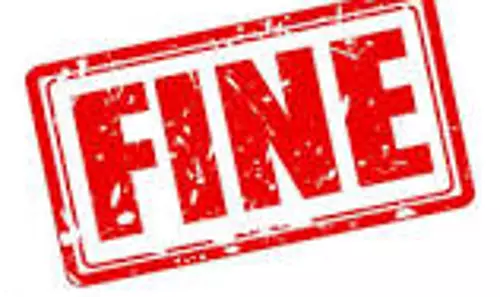 ராசிபுரம் அரசு கல்லூரியில்   மரங்களை வெட்டி விற்றதாக முதல்வருக்கு ரூ.2.18 லட்சம் அபராதம்