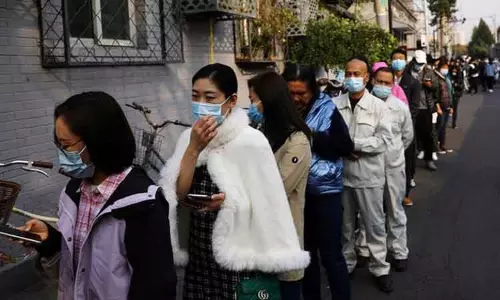 அறிகுறி இல்லாத கொரோனா பாதிப்புகளை இனி பதிவு செய்யப்போவது இல்லை - சீனா அறிவிப்பு