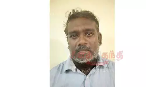 சப்-இன்ஸ்பெக்டருக்கு மிரட்டல் விடுத்தவர் கைது
