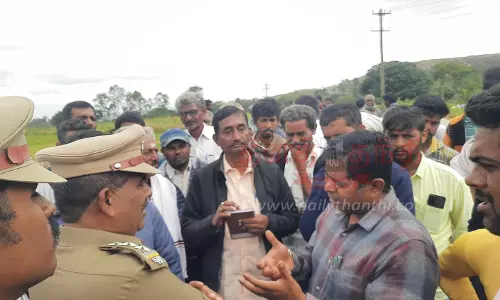 வனத்துறையினருடன், விவசாயிகள் வாக்குவாதம்