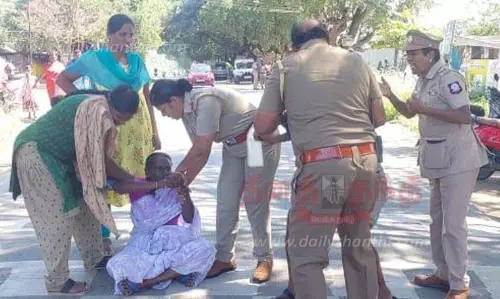 மூதாட்டி குடும்பத்துடன் சாலை மறியல்