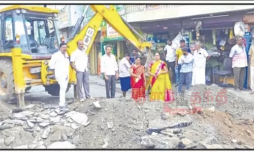 கல்வாயை தூர்வாரி, சிறு பாலம் கட்டும் பணி