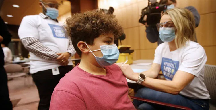 அமெரிக்கர்களுக்கு ஆண்டுக்கு ஒரு முறை கொரோனா பூஸ்டர் டோஸ் பரிந்துரை