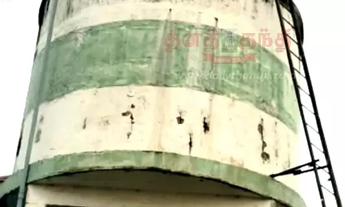 மேல்நிலை நீர்த்தேக்க தொட்டி மீது ஏறி தொழிலாளி போராட்டம் மேல்நிலை நீர்த்தேக்க தொட்டி மீது ஏறி தொழிலாளி போராட்டம்