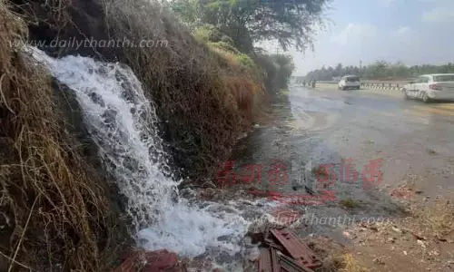 குழாய் உடைந்து அருவி போல் கொட்டிய குடிநீர்