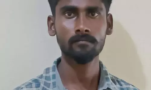 தொழிலாளிக்கு அரிவாள் வெட்டு; வாலிபர் கைது