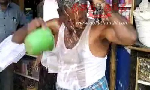 வாடகை நிலுவை தொகையை வசூலிக்க அதிகாரிகள் சென்றபோது பெட்ரோலை உடலில் ஊற்றி கடைக்காரர் தீக்குளிக்க முயற்சி; புஞ்சைபுளியம்பட்டியில் பரபரப்பு