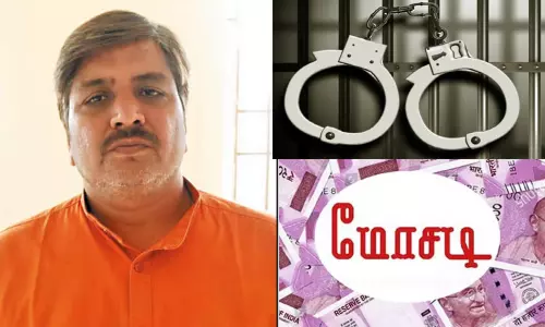 வீட்டுமனை வாங்கி தருவதாக கூறி ரூ.50 லட்சம் மோசடி செய்தவர் கைது