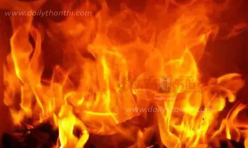 மனைவியுடன் லாரி டிரைவர் தீக்குளிக்க முயற்சி மனைவியுடன் லாரி டிரைவர் தீக்குளிக்க முயற்சி