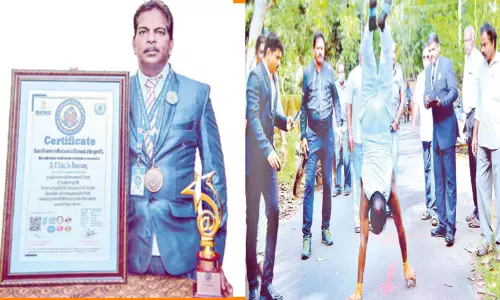 தலைகீழாக ஓடுவதில் இரண்டு உலக சாதனைகளை நிகழ்த்தியவர்