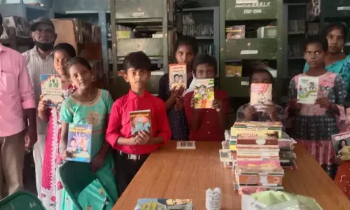 நூலகத்தில் மாணவர்கள் புத்தக வாசிப்பு நூலகத்தில் மாணவர்கள் புத்தக வாசிப்பு