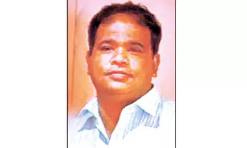 பி.எஸ்.என்.எல். அலுவலக மாடியில் இருந்து விழுந்த அதிகாரி சாவு