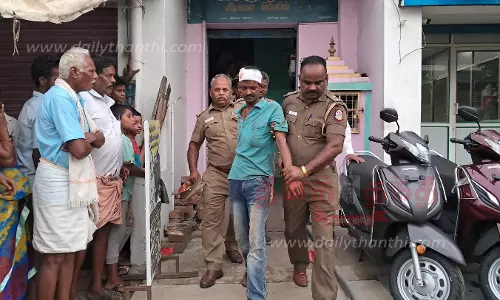 போதையில் விபத்தில் சிக்கிய ஓட்டல் தொழிலாளி செல்போன் டவரில் ஏறி தற்கொலை மிரட்டல்