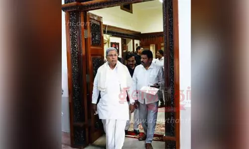 பெங்களூரு விதானசவுதாவில் வாஸ்து சரியில்லை என கூறி மூடப்பட்ட முதல்-மந்திரி அலுவலக தெற்கு கதவு திறப்பு; சித்தராமையா அதிரடி நடவடிக்கை