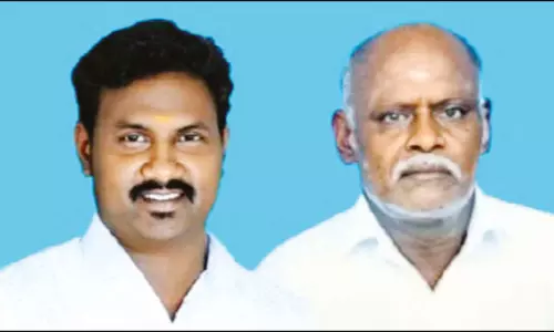 மோட்டார்சைக்கிளில் முந்திச்சென்றபோது விபத்து: கன்டெய்னர் லாரி சக்கரம் ஏறி தந்தை-மகன் பலி