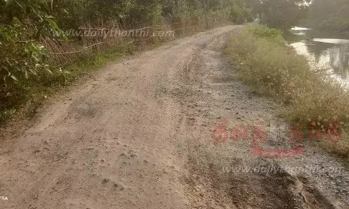 குண்டும், குழியுமான சாலை சீரமைக்கப்படுமா?