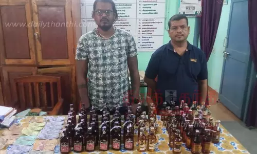 தக்கலை அருகேமதுவிற்ற 2 பேர் கைது