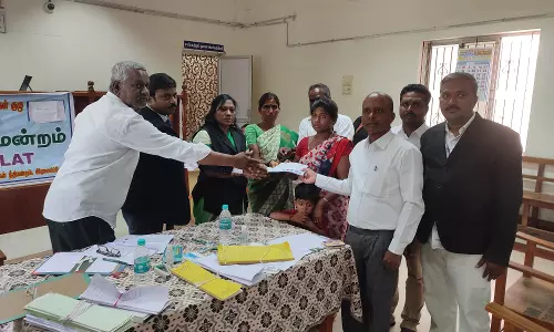 பொக்லைன் டிரைவர் குடும்பத்துக்கு ரூ.20½ லட்சம் இழப்பீடு