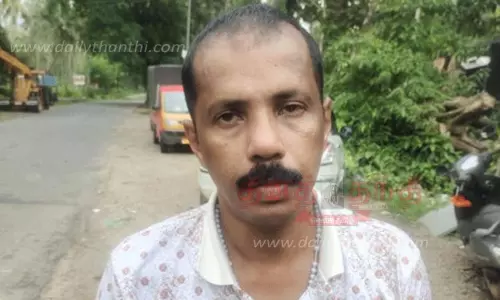 மதுக்கடைகளில் திருட்டில் ஈடுபட்ட கேரள ஆசாமி சிக்கினார்