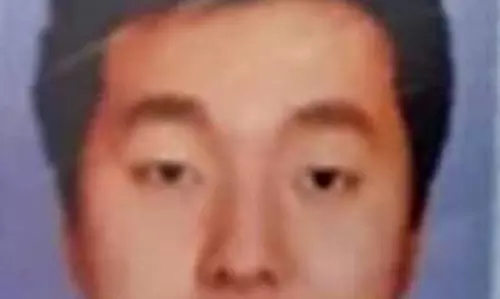 புத்தூரில் சந்தேகத்திற்கு இடமாக சுற்றிய  ஜப்பான் வாலிபரிடம் போலீசார் விசாரணை