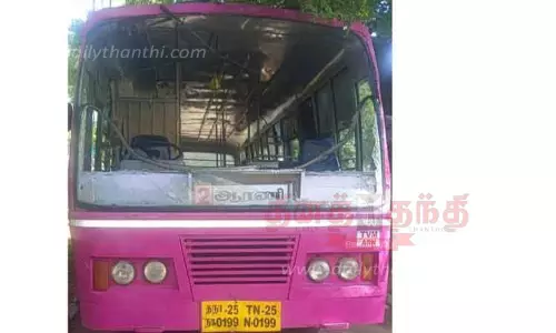 பஸ் கண்ணாடியை உடைத்தவர் கைது