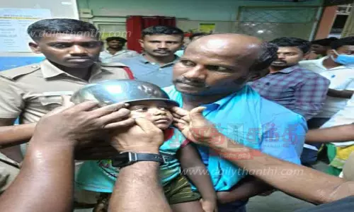 சிறுவன் தலையில் மாட்டிக் கொண்ட சில்வர் பாத்திரம்; தீயணைப்பு படையினர் லாவகமாக அகற்றினர்